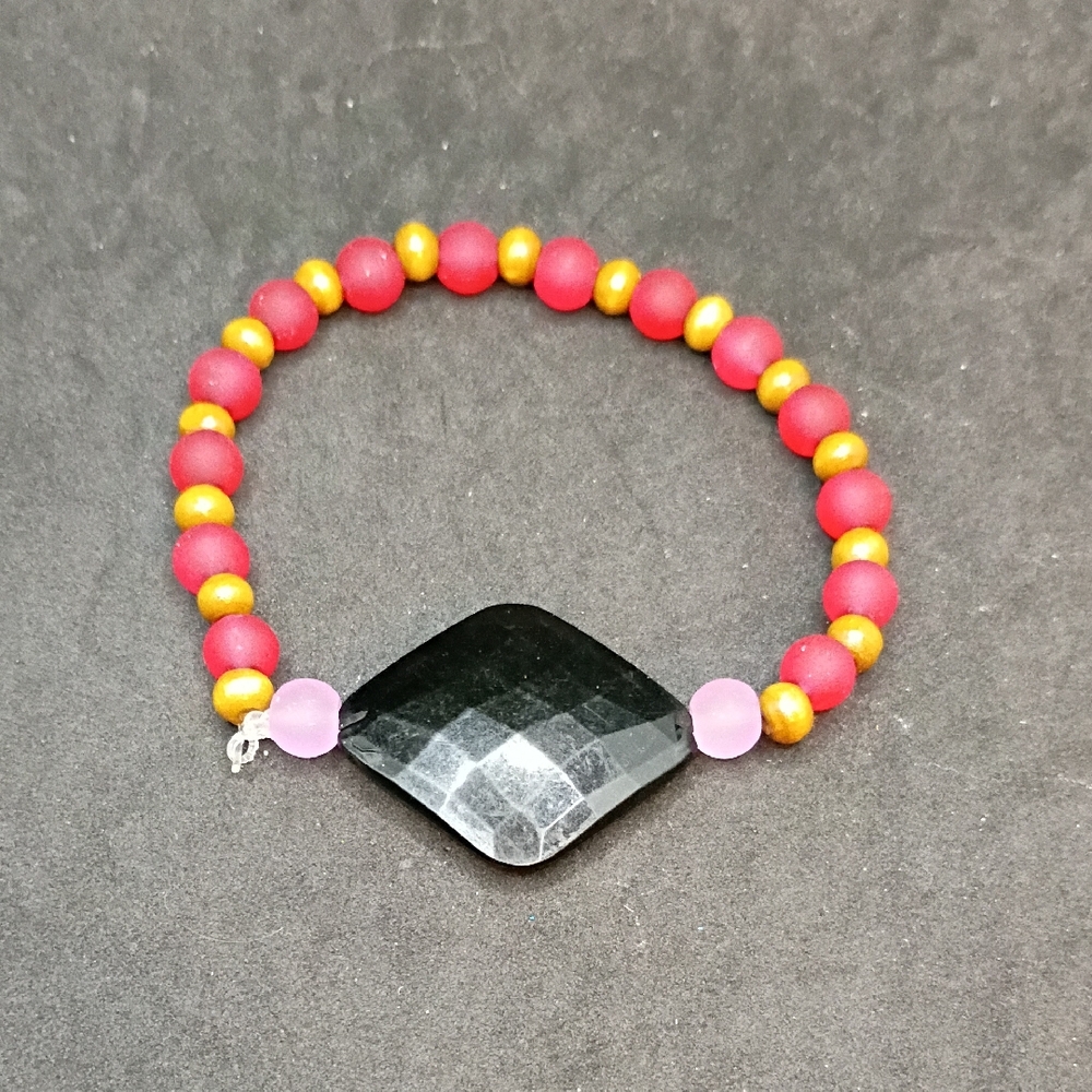 Hand Crafted Kids Bracelet with Black, Pink, and Brown Beads
